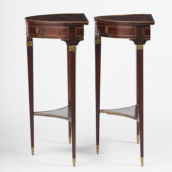 A pair of late Gustavian mahogany consoles in the manner of A. Lundelius, Stochkolm, late 18th century.