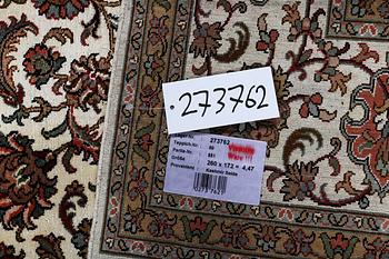 A carpet, silk Kashmir, ca 260 x 172 cm.