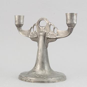 A Kayserzinn pewter vase and candelabrum, German, early 20th Century.