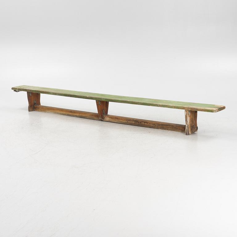 A painted bench, 20th Century.