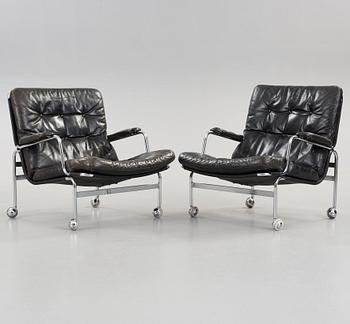 Bruno Mathsson, a pair of 'Karin' easy chairs, DUX, Sweden.