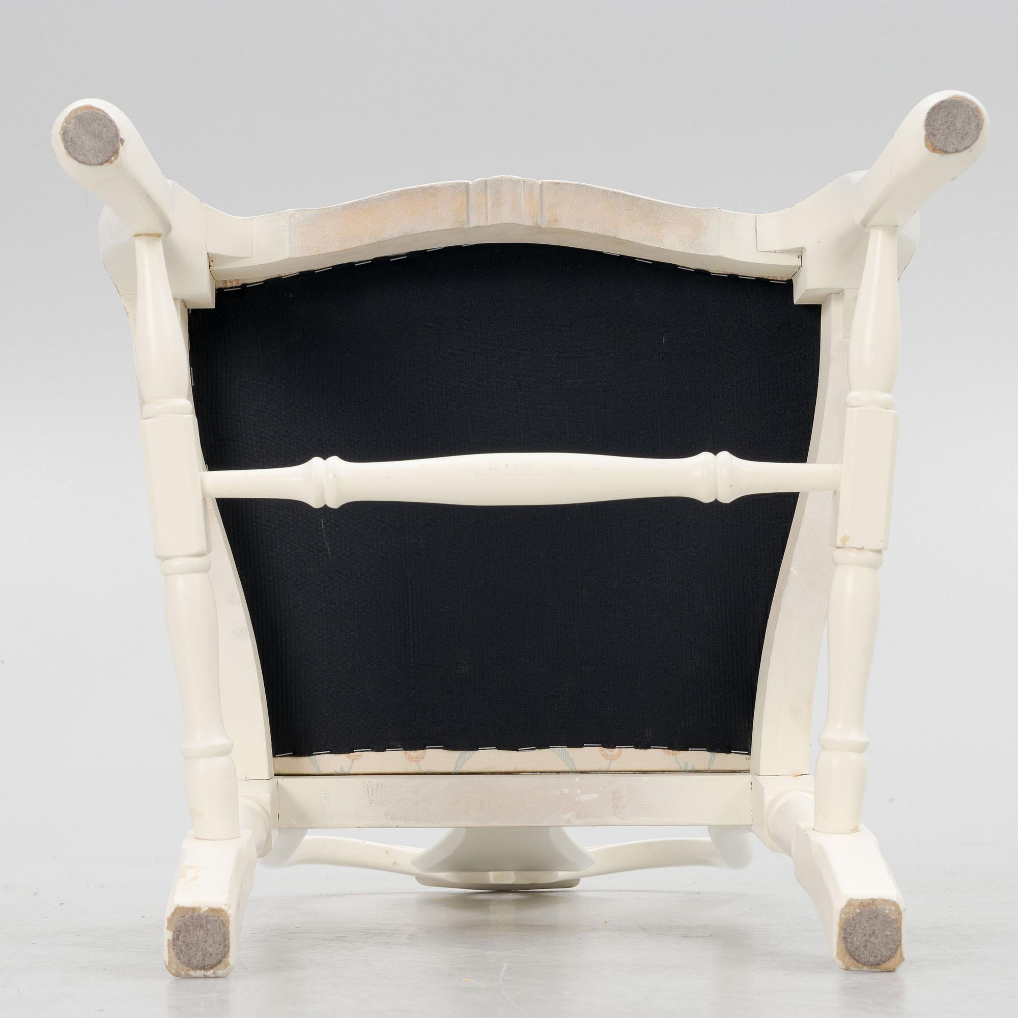 A Rococo style dining table with eight chairs, second half of the 20th century.