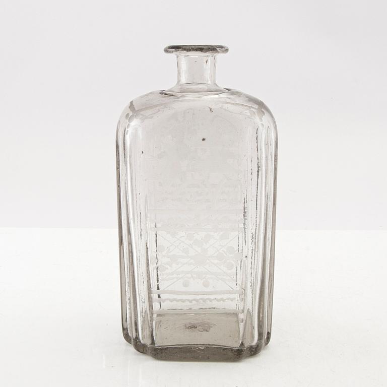 Flaska, glas. Troligen Skånska glasbruket, 1700-tal.