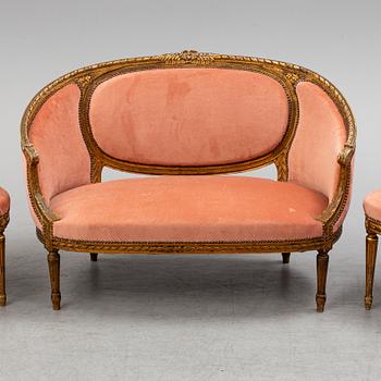 A sofa and a pair of chairs, Louis XVI-style, late 19th century.