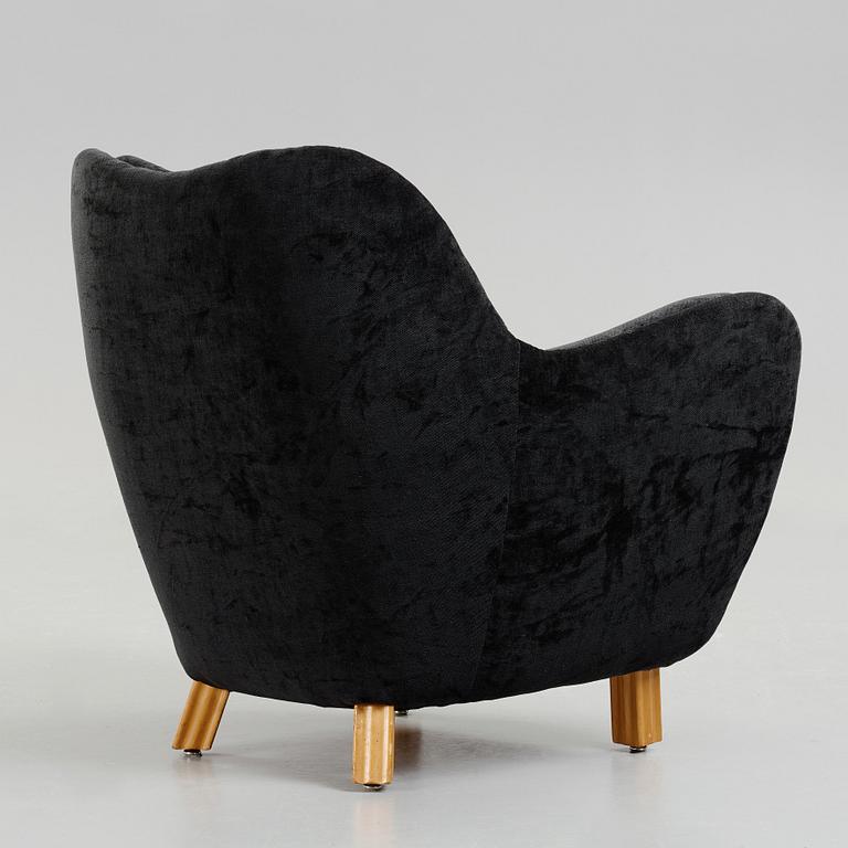Swedish designer, an upholstered easy chair, 1950's.