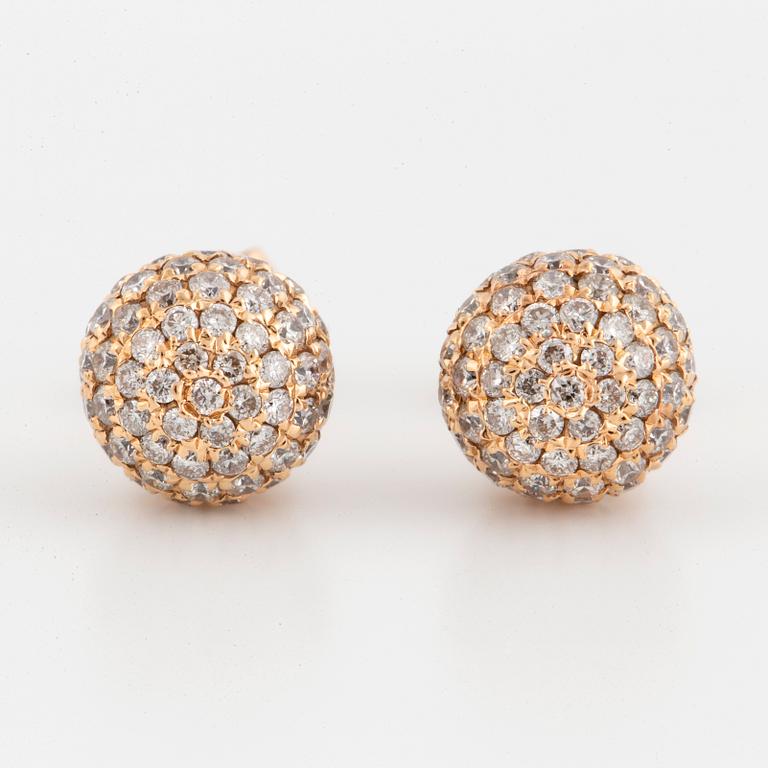 Brilliant-cut diamond ball earrings.