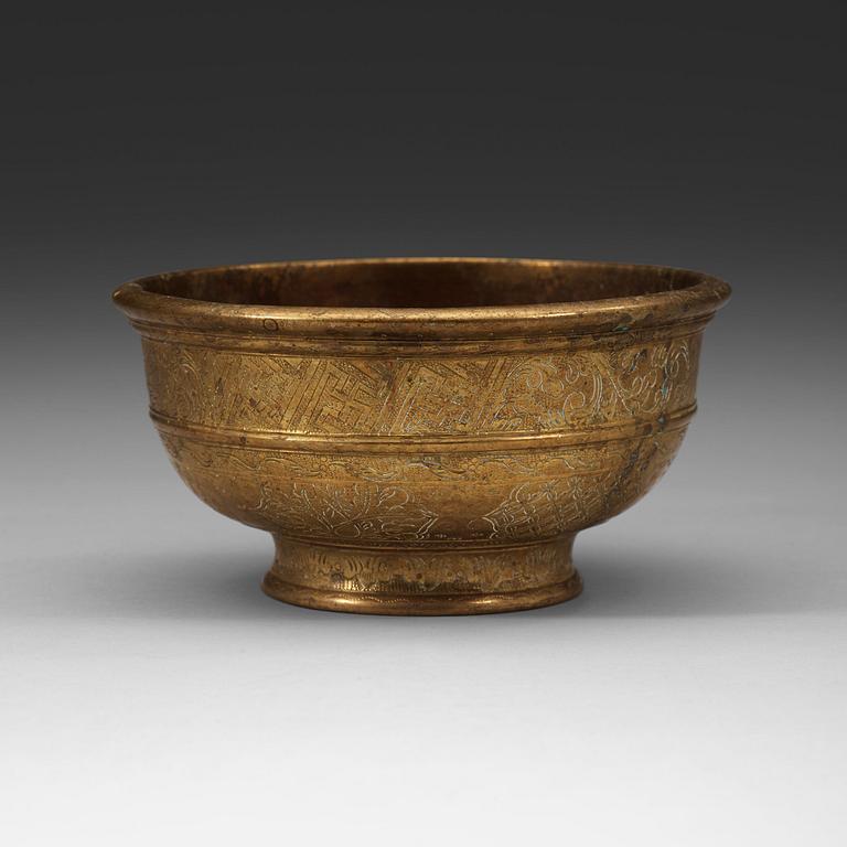 A Tibetan bronze bowl, 19th Century.