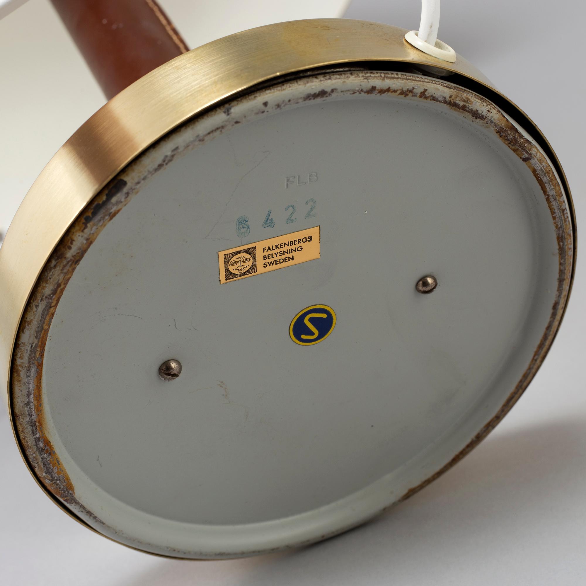 A brass and leather table light from Falkenbergs Belysning, second half of the 20th Century.
