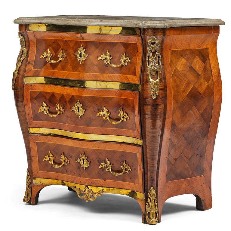A rococo parquetry commode by C. Linning (master in Stockholm 1744-79).