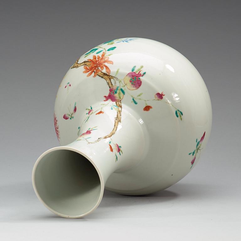 A famille rose vase, China, Republic, 20th Century, with Qianlong four character mark in red.