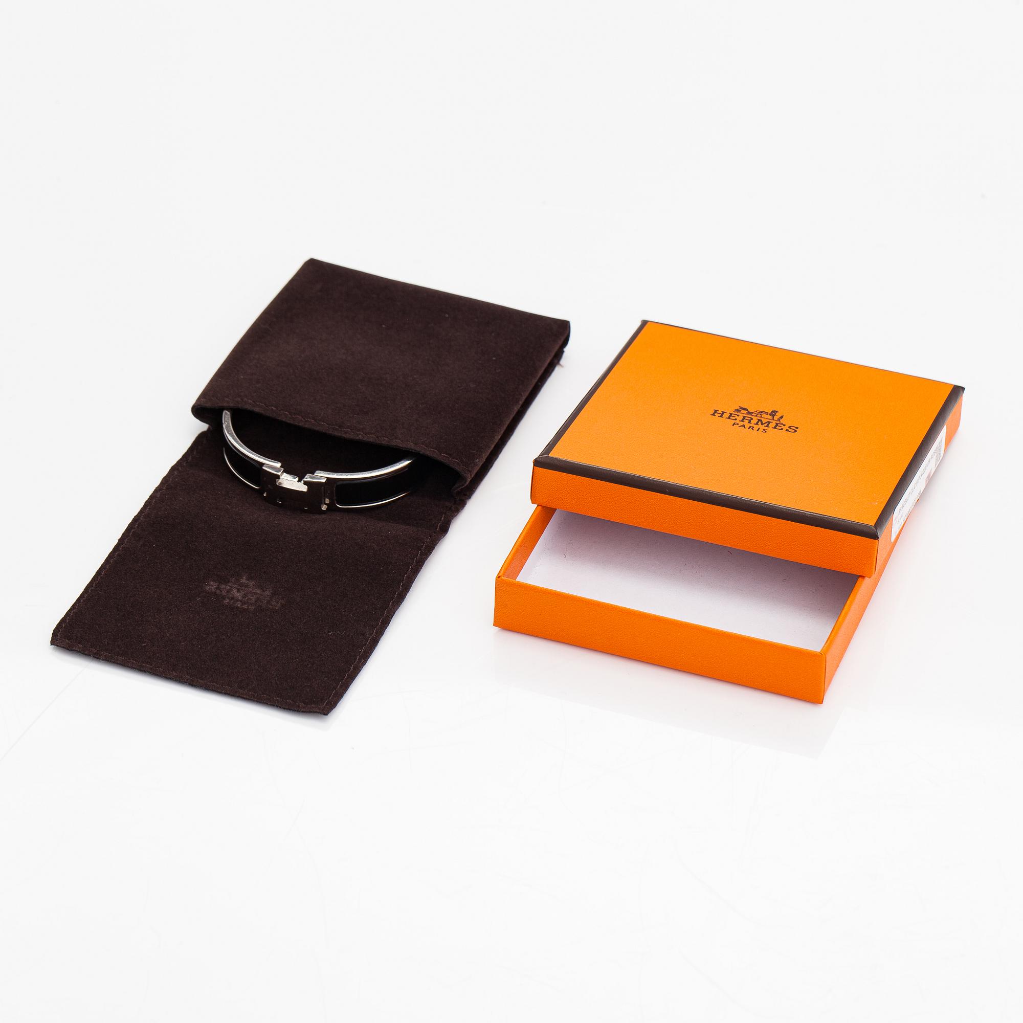 Hermès, armband, "Clic H PM", silverfärgad metall och svart emalj.