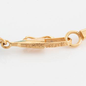 Arvo Saarela, Halscollier stavar i guld och turkoser.