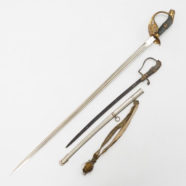 Two German sabres whereof one boy's sabre.