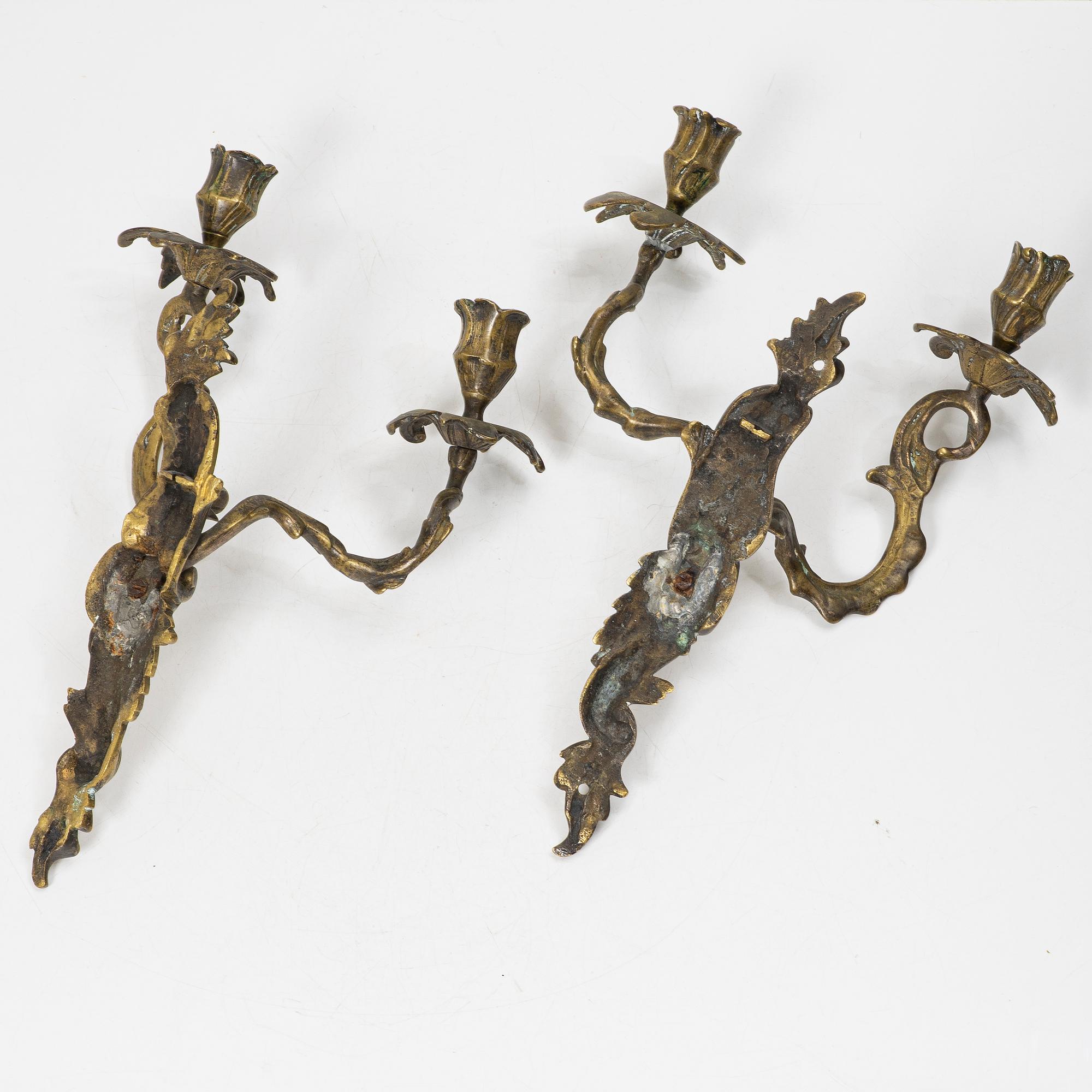 A pair of Rococo style wall sconces, 19th century.