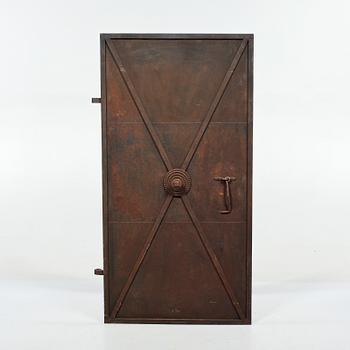A 19th century metal and cast iron door.