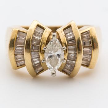 A ca 0.55 ct marquise-cut diamond ring with baguette-cut diamonds.
