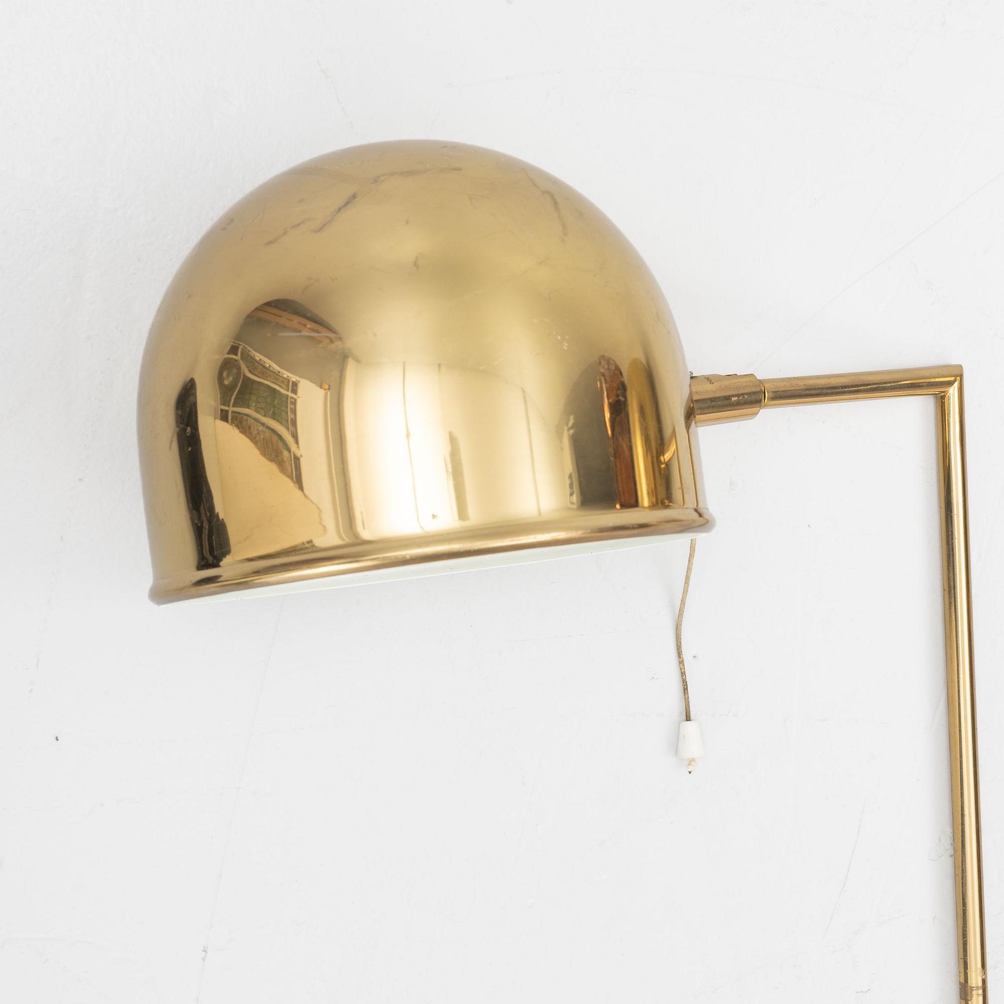Eje Ahlgren, A pair of brass wall lights, "V-75", Bergboms.