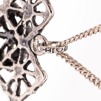 PENTTI SARPANEVA, A silver necklace, brooch and ring. Turun Hopea, Turku 1968 and 1975.