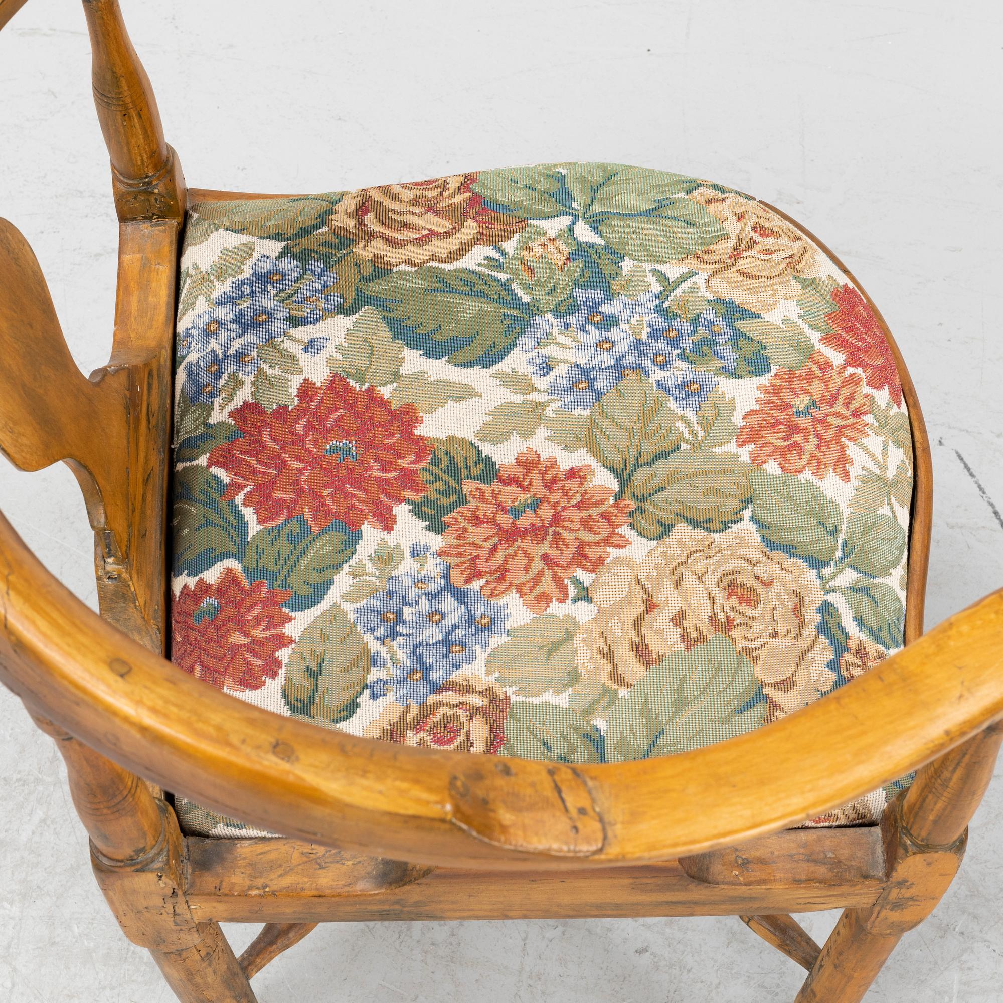 A Rococo armchair, mid 18th century.