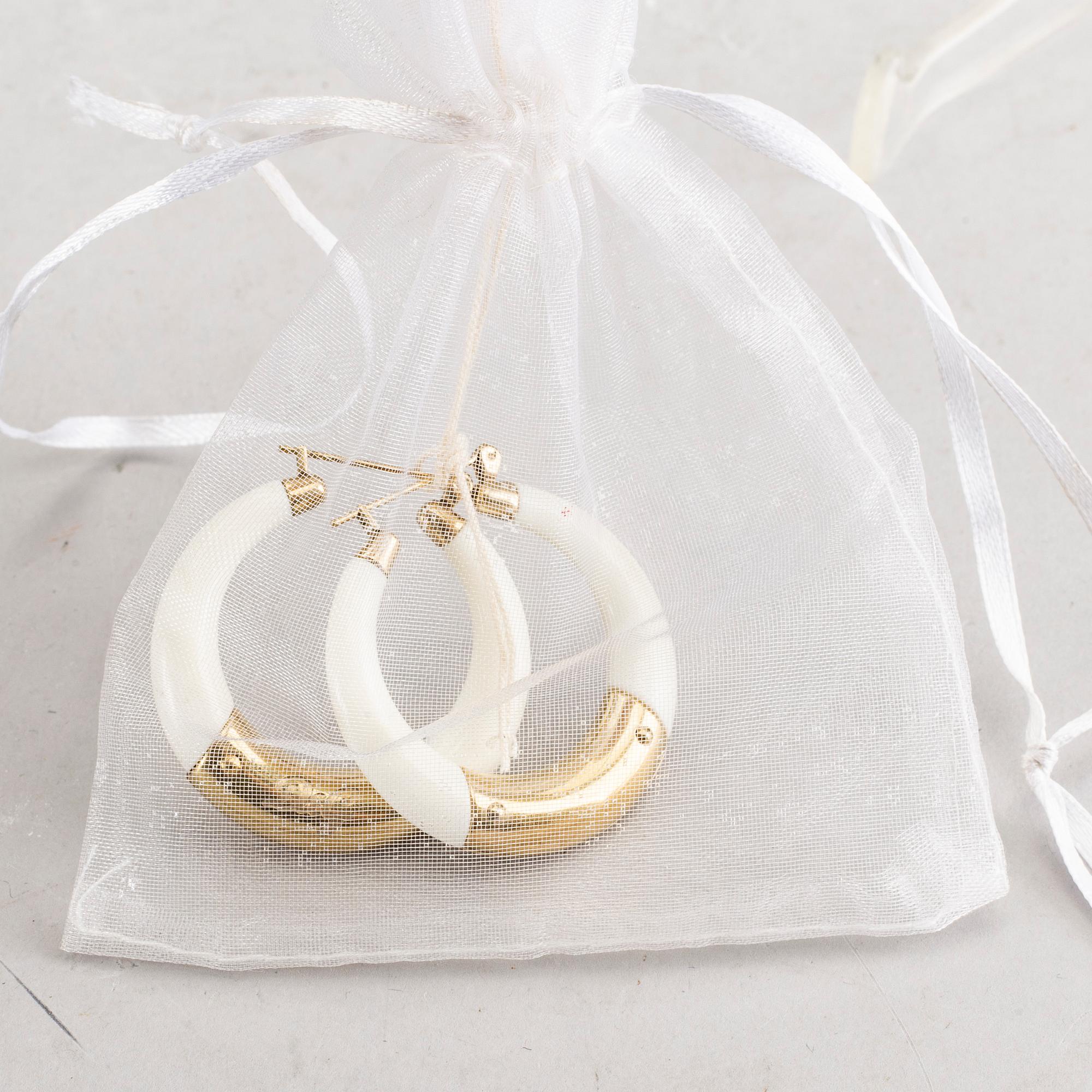 A pair of Dolce & Gabbana earrings.
