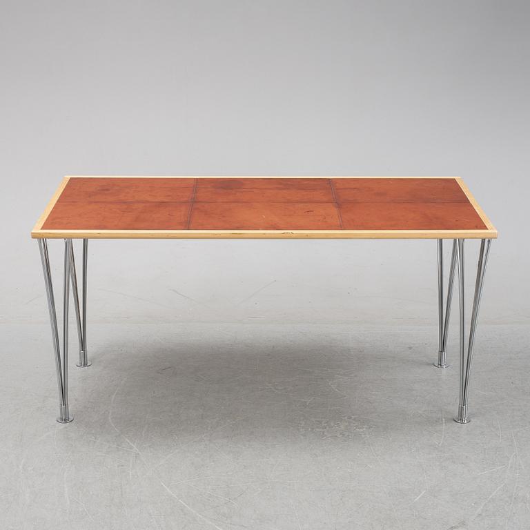 A birch and leather dining table produced by Mathsson International, 21th century.