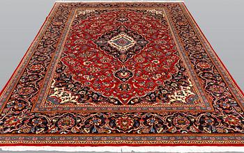 A Kashan carpet, approximately 315 x 200 cm.