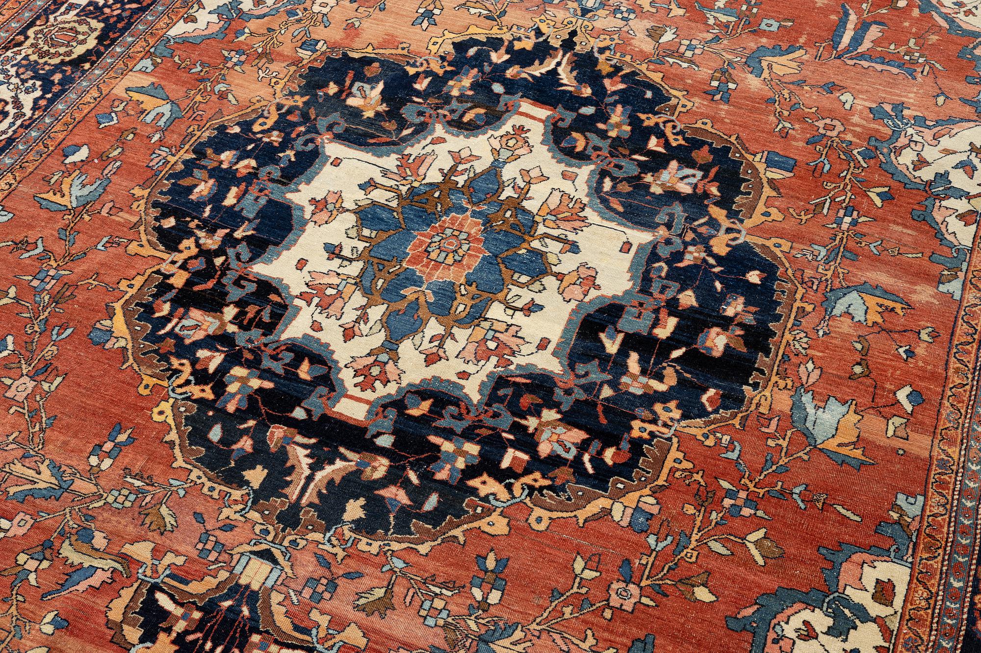 An Antique Sarouk carpet, West Persia, c. 353 x 260 cm.
