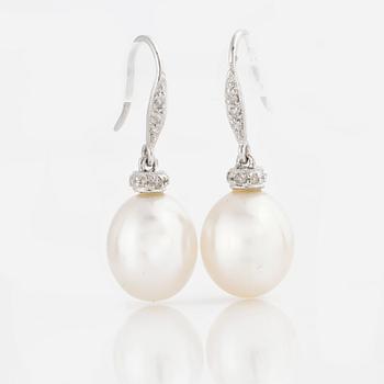 A pair of cultured pearl and brilliant-cut diamond earrings.