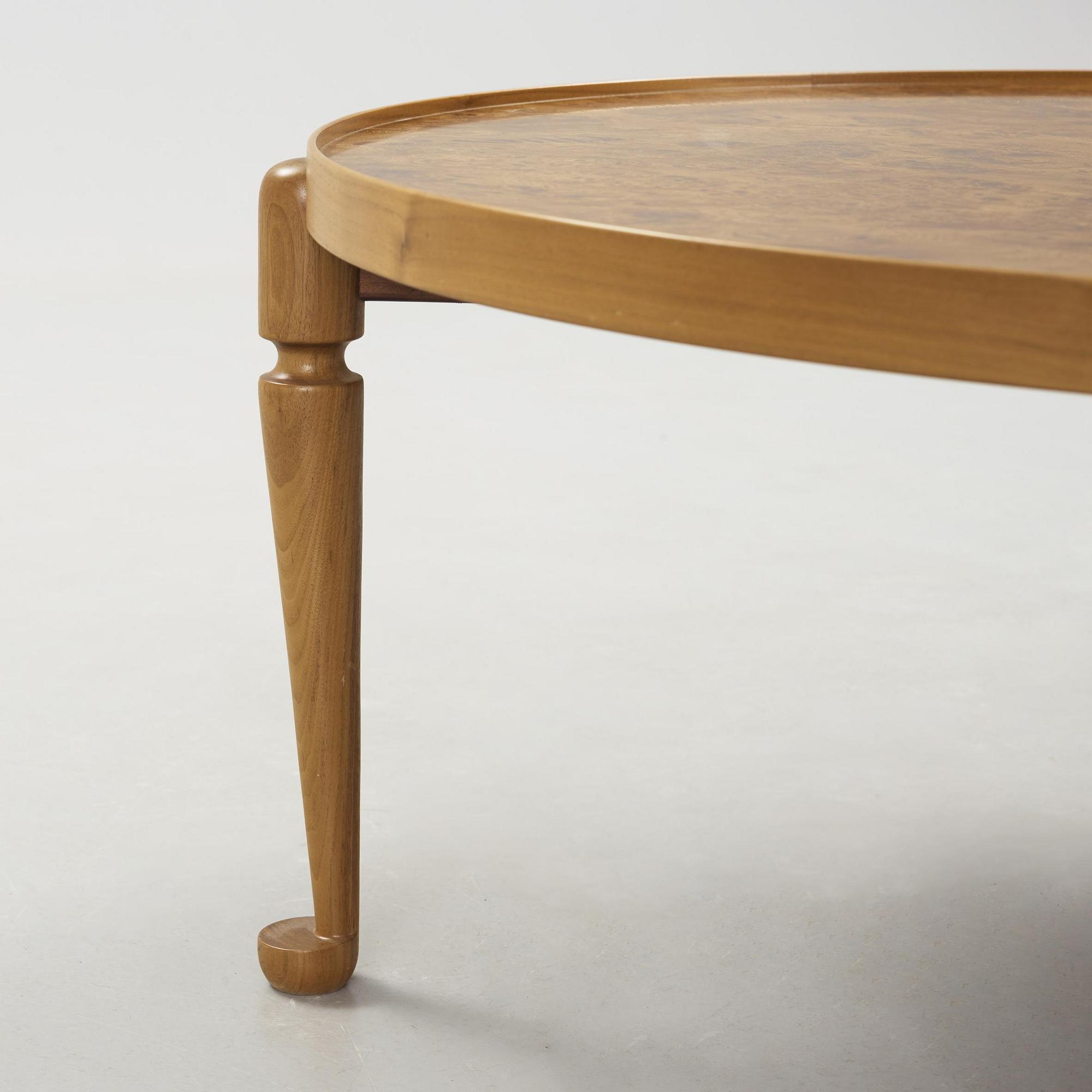 A Josef Frank walnut and burled wood sofa table, model 2139, post 1985.