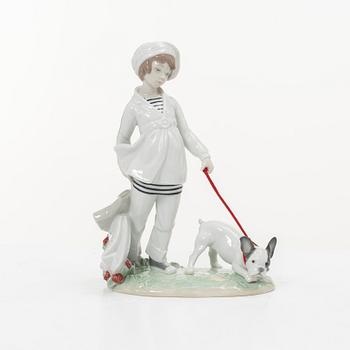 Lladró, three figurines,"Girl with French bulldog", "Girl with Dalmatians" and "Petals in the pond", Spain.