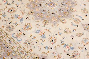 A Keshan carpet, approx. 300 x 206 cm.