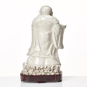 A blanc de chine figure of Buddai, Qing dynasty.