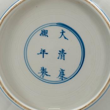 A pair of blue and white dishes, Qing dynasty, with Kangxi six character mark and period (1662-1722).