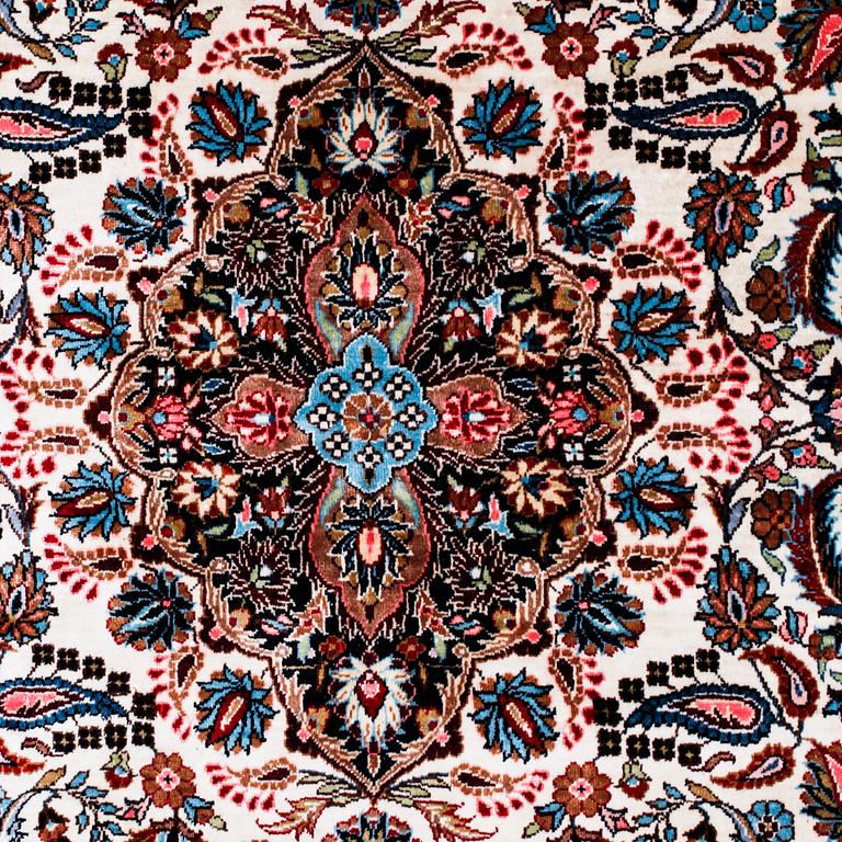 A chinese rug, probably, silk, 152 x 94 cm.