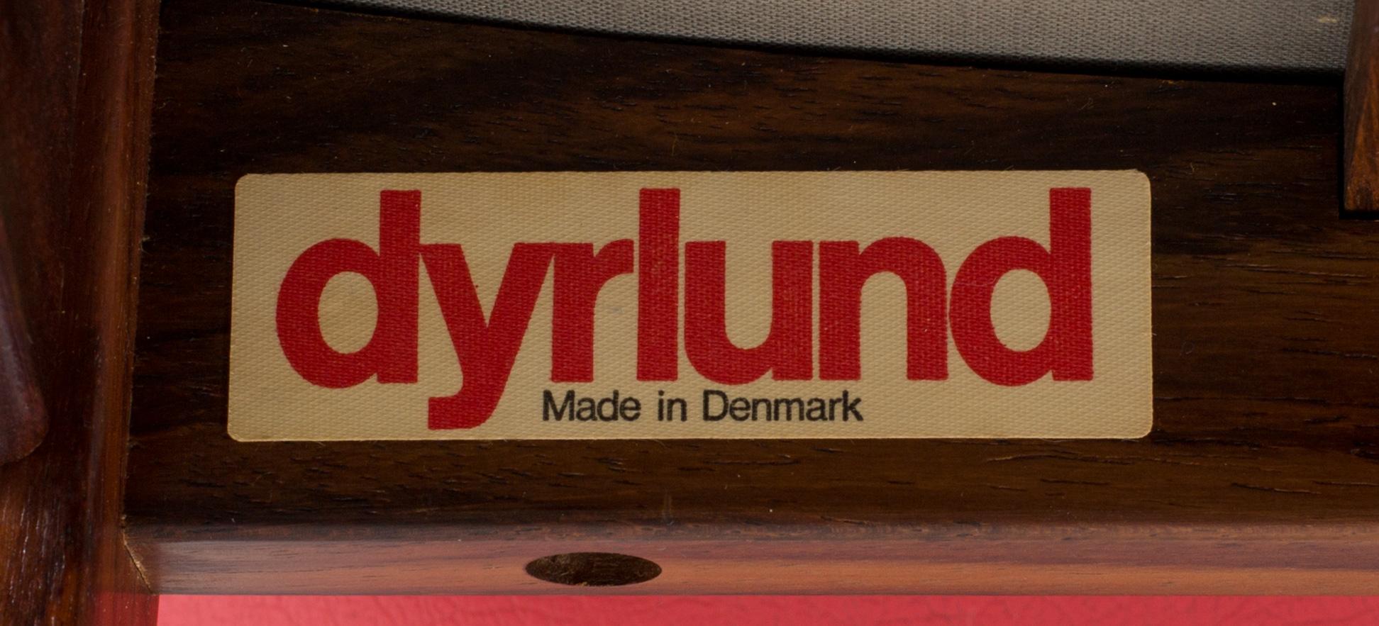 A danish 1960's Smith & Dyrlund bar with three barstools.