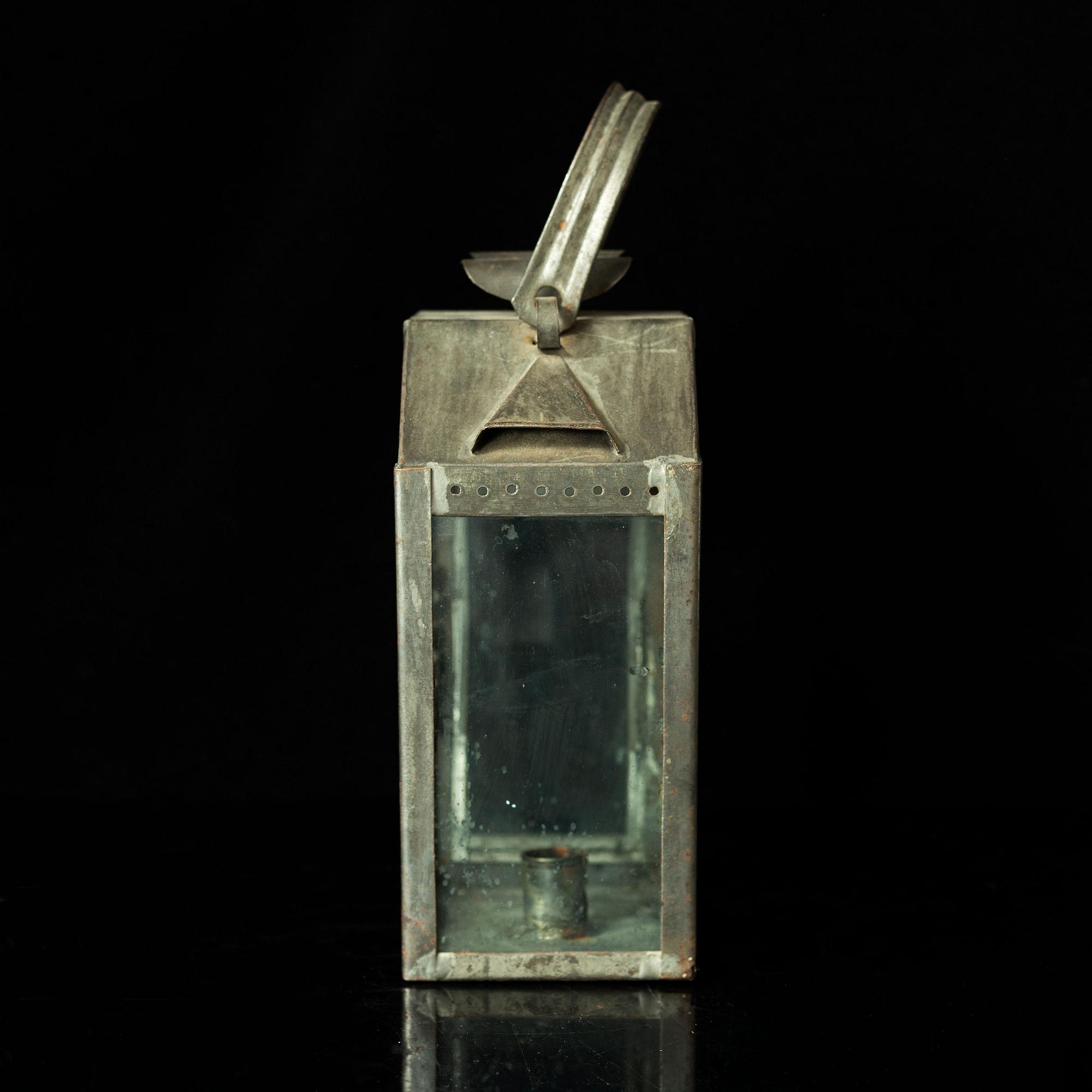 An 18th century tinplate lantern.