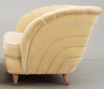 A Swedish off-white velvet plush three-seated sofa, 1930-40's.