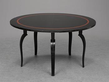 A Carl Hörvik black lacquered and burr wood table, Nordiska Kompaniet, circa 1928.