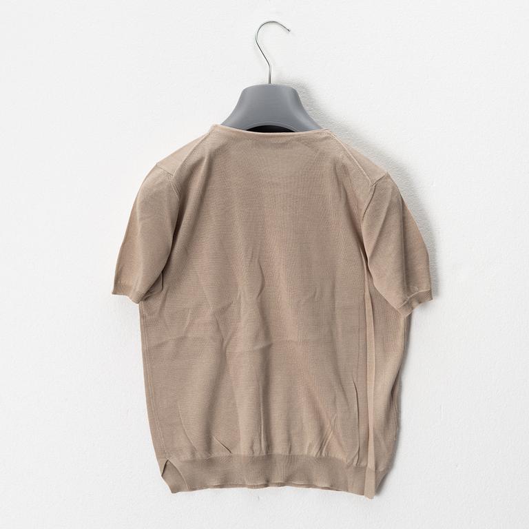 Prada, a set of three silk tops, size 40.