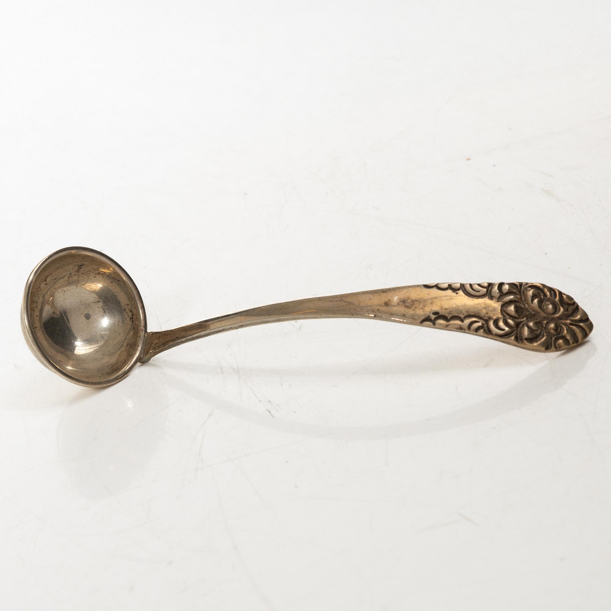 A silver sauceboat with tray and spoon, Anaya, Mexico, second half of the 20th Century.