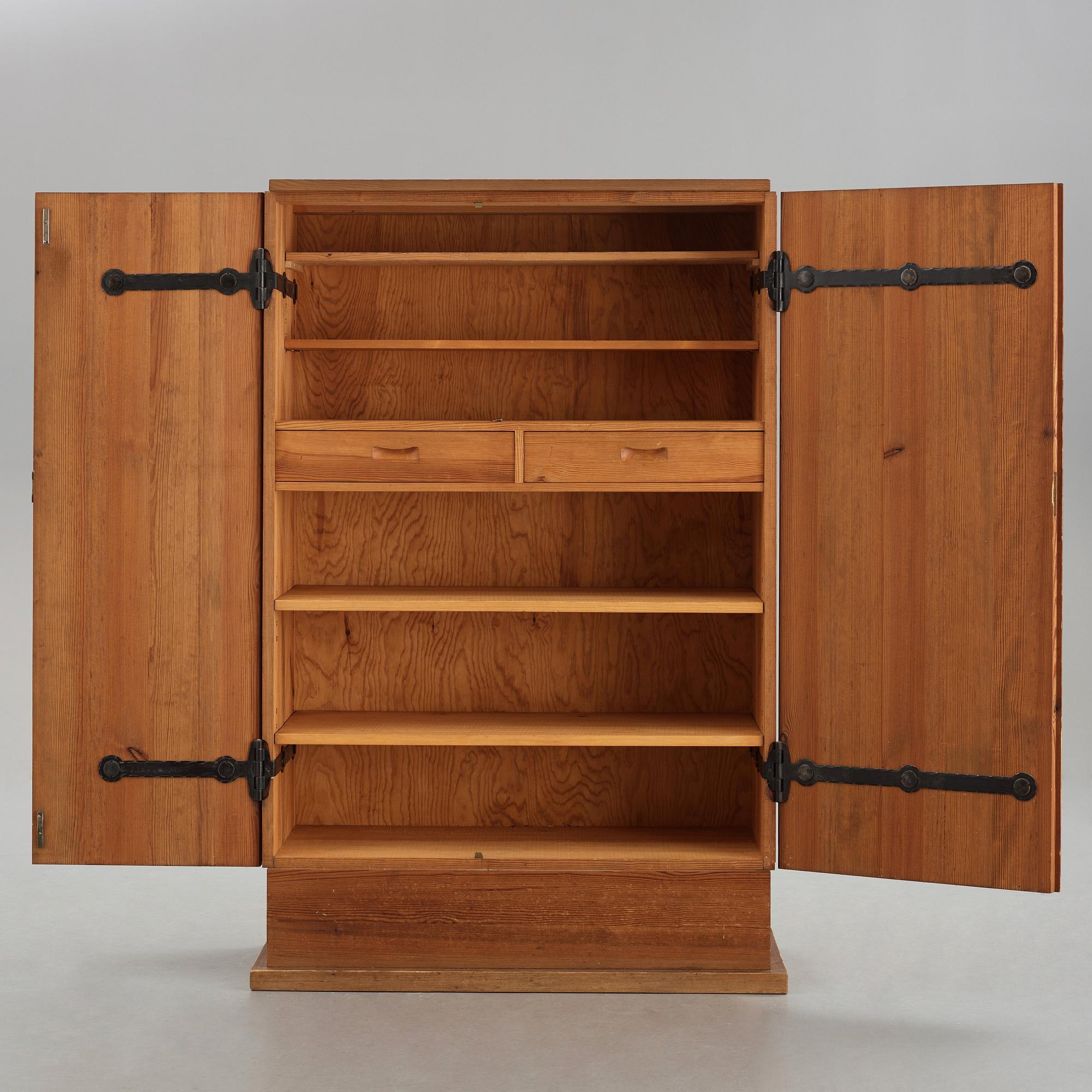 Axel Einar Hjorth, a stained pine "Lovö" cabinet, Nordiska Kompaniet, Sweden 1930's.