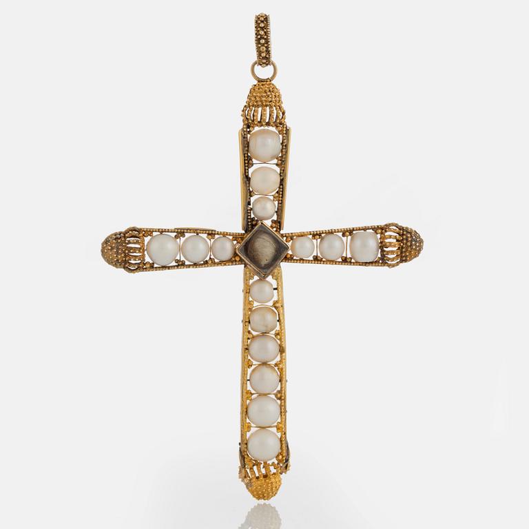 A pearl cross pendant and two pearl necklaces.