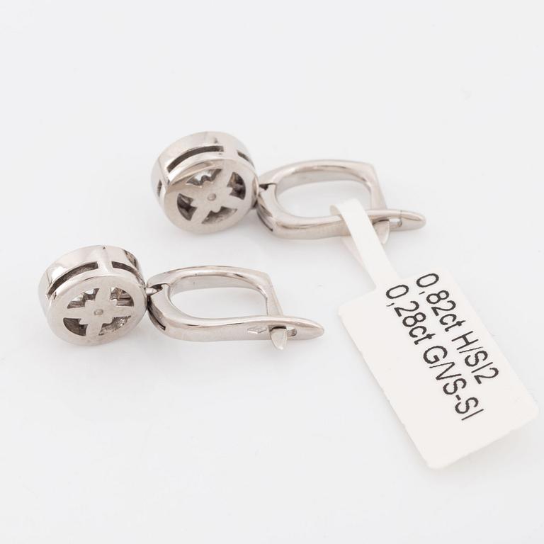 Brilliant-cut diamond earrings.