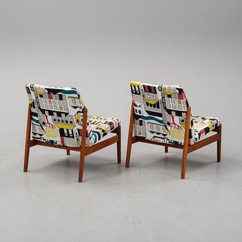 A pair of easy chairs by Alf Svensson for Bodafors, dated 1963.