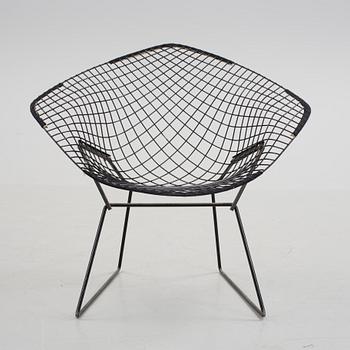 A "Diamond chair" by Harry Bertoia.