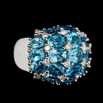 RING, 18 k vitguld, briljantslipade diamanter tot ca 0.80 ct samt 21 turkosa topaser.