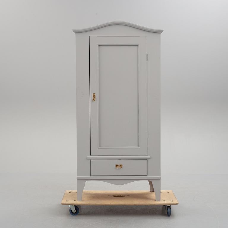 A first half of the 20th century painted cabinet.