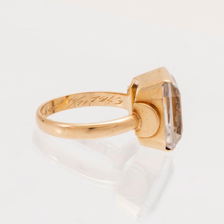 Ring och örhängen 18K guld samt fasettslipade bergskristaller.