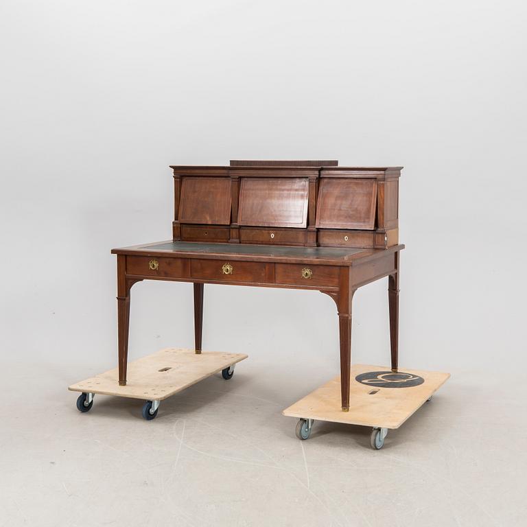 A Gustavian style mahogany desk around 1900.