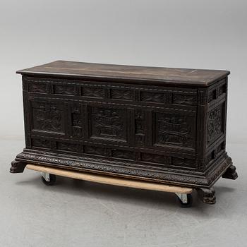 A 19th century baroque style oak chest.